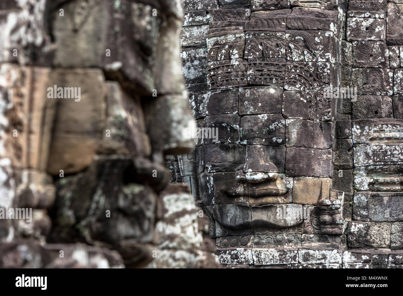Tempio Bayon Buddha Sorridente faccia Angkor Wat Siem Reap Cambogia Sud Est Asia Travel Foto Stock