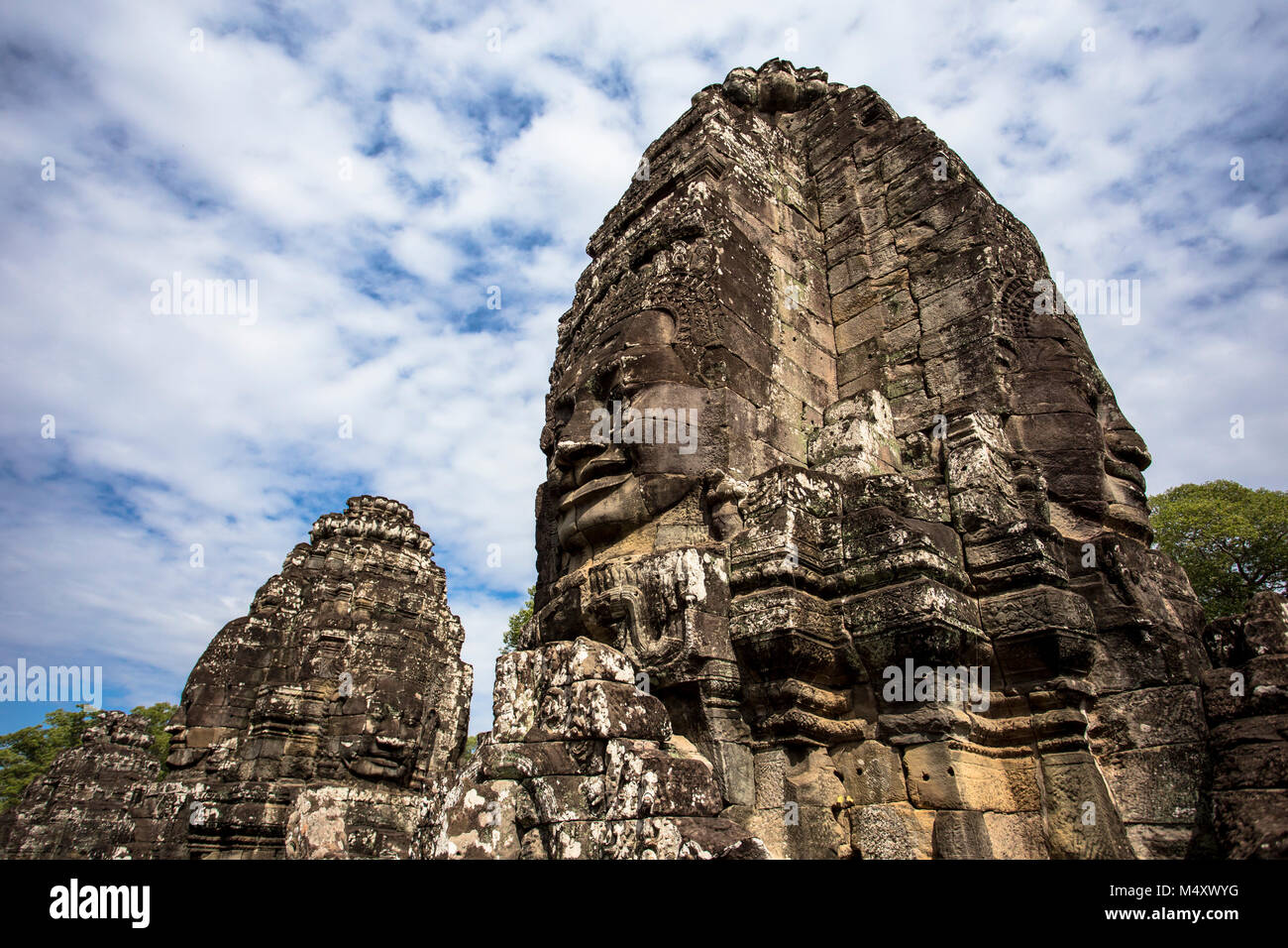 Tempio Bayon Buddha Sorridente faccia Angkor Wat Siem Reap Cambogia Sud Est Asia Travel Foto Stock