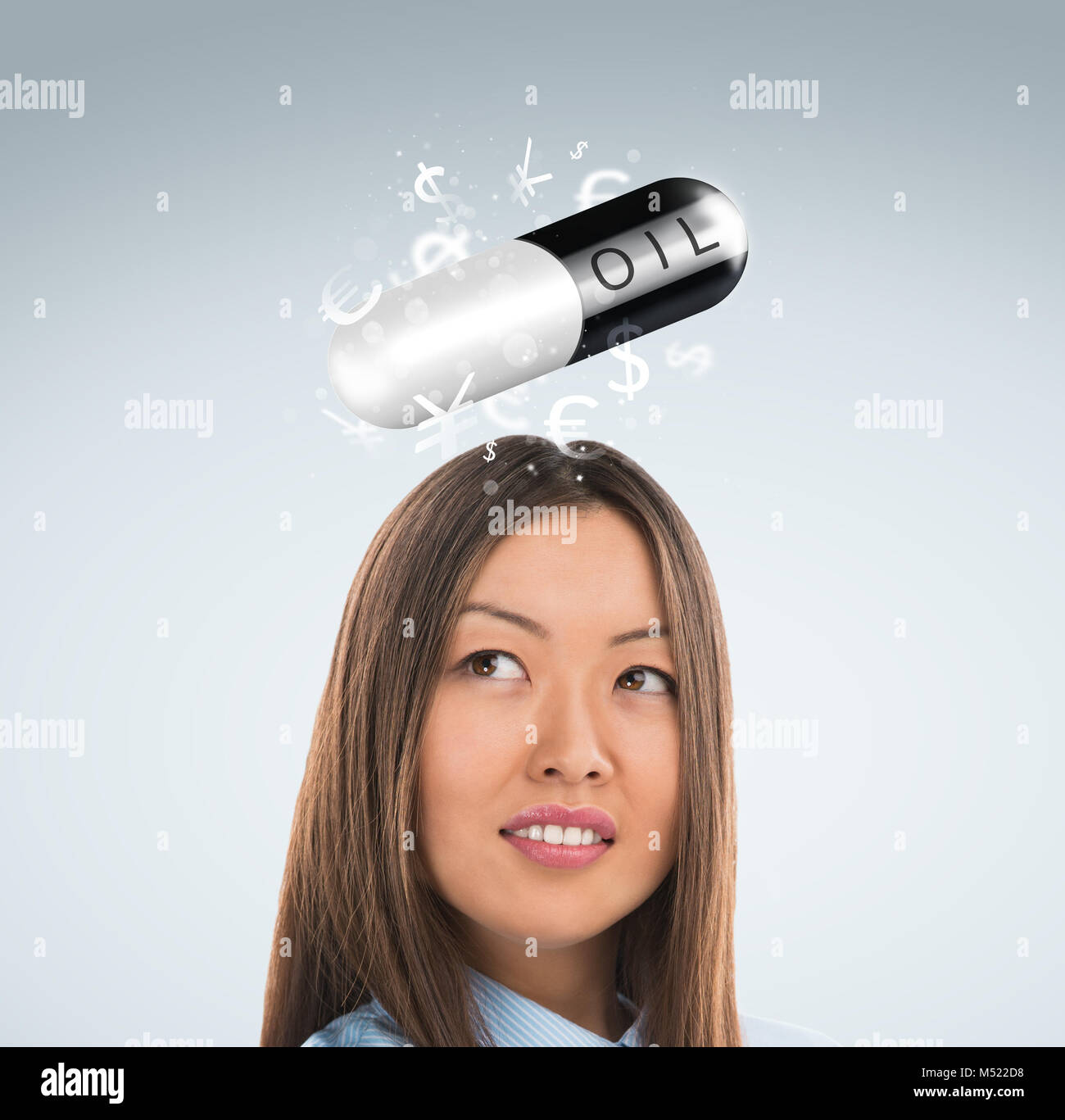 Concetto di investimento. Bella donna d'affari con i simboli di valuta. Foto Stock