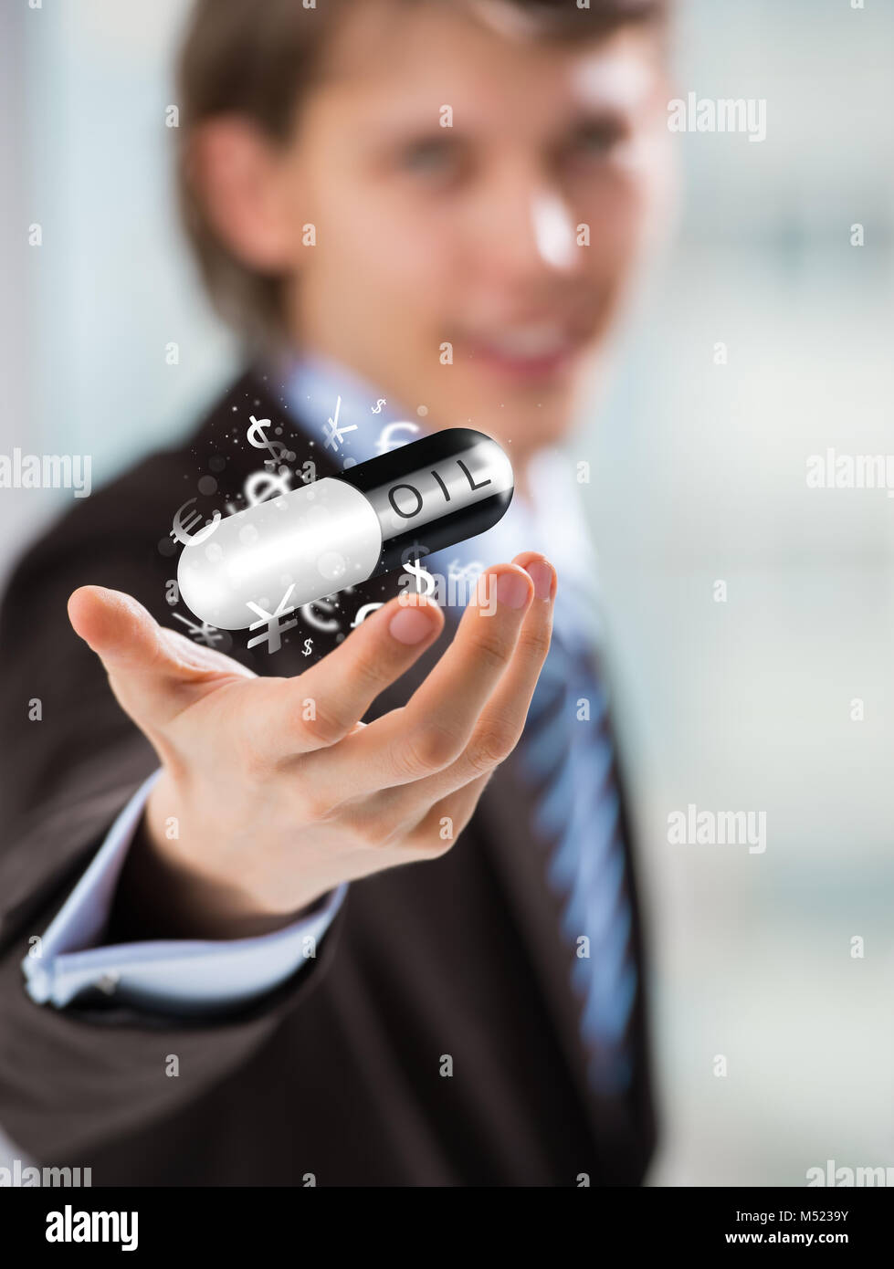Concetto di investimento. Bel uomo d affari con i simboli di valuta. Foto Stock