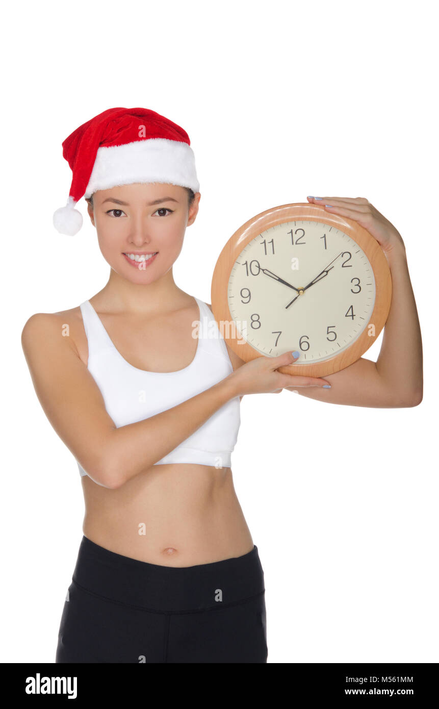 Felici donne asiatiche in una santa del cappello con un orologio Foto Stock