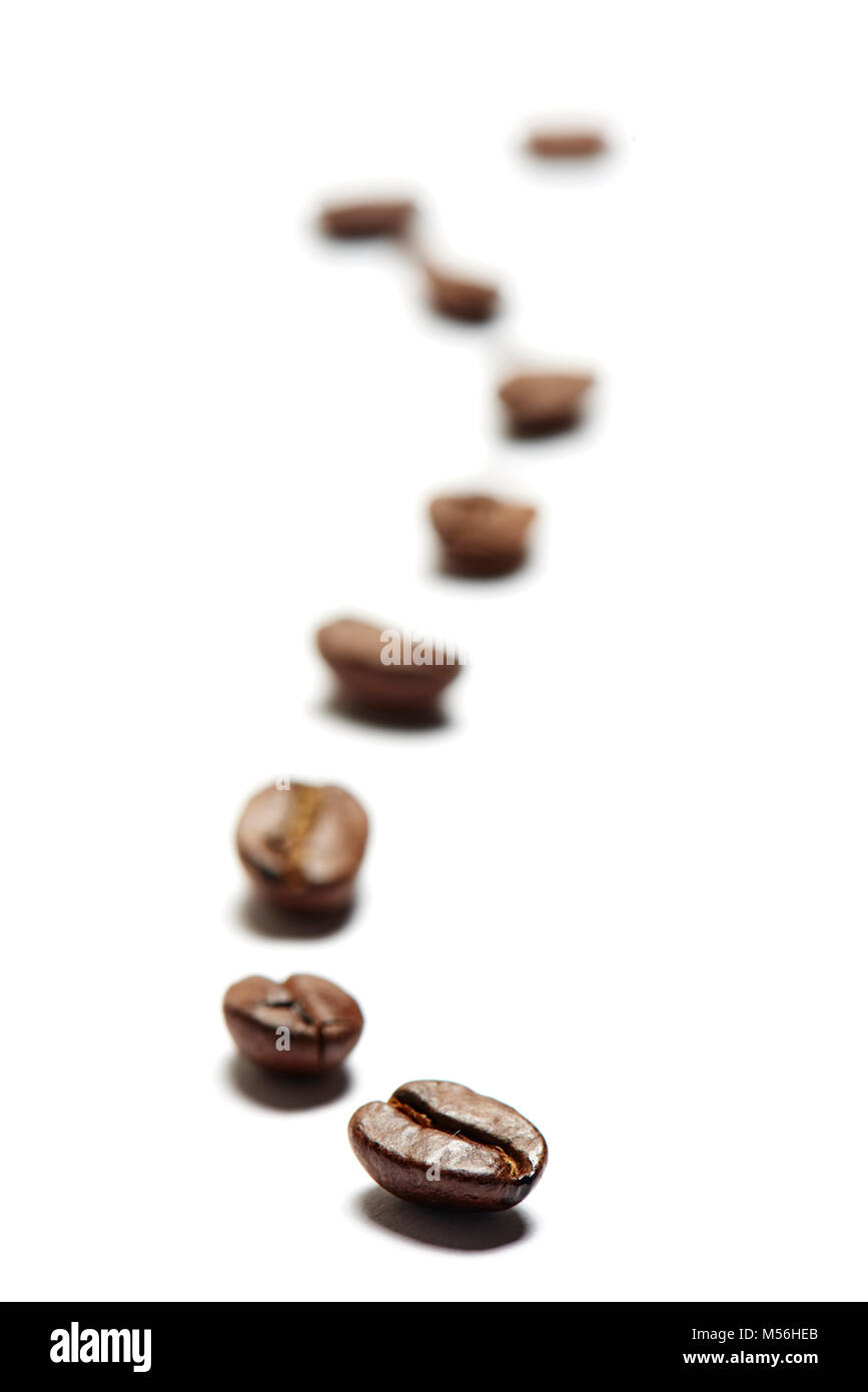 Eine Reihe Kaffeebohnen Foto Stock