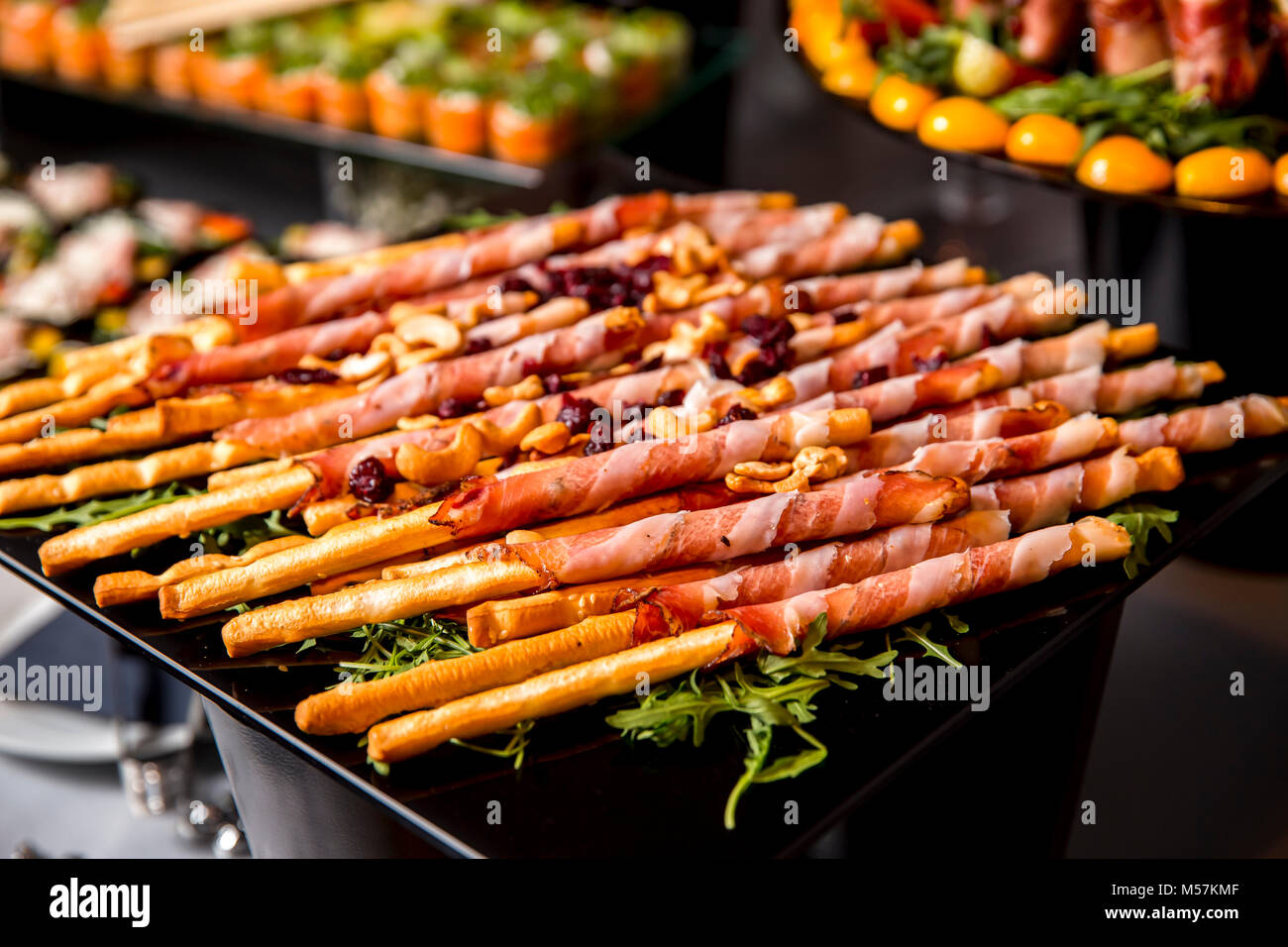 Grissini grissini con prosciutto Foto Stock