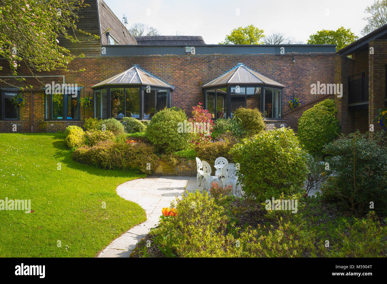 Area giardino a Potters Heron Hotel in Hampshire REGNO UNITO Foto Stock