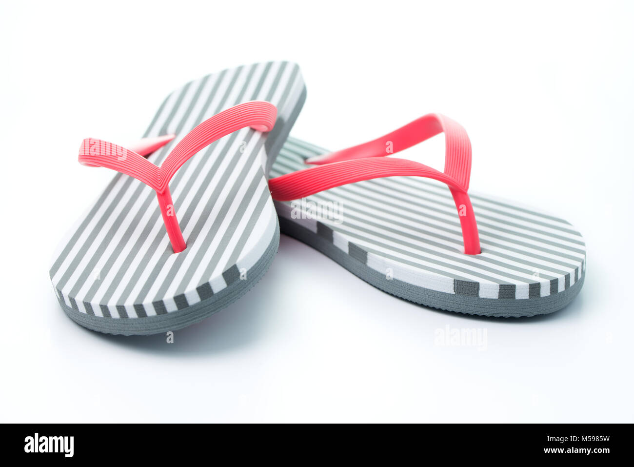 Il flip flop isolati su sfondo bianco Foto Stock