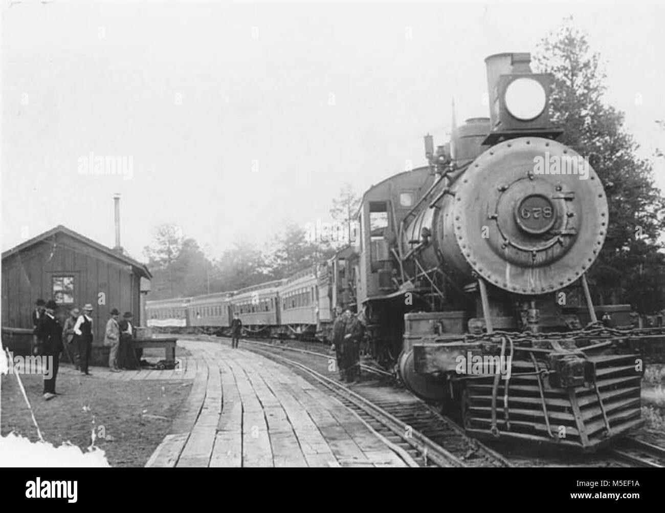 Grand Canyon Historic Railroad Depot 'Scuola insegnanti " Treno nel GRAND CANYON CANTIERE. Deposito originale SHACK & Boardwalk. CIRCA 1904. Foto Stock