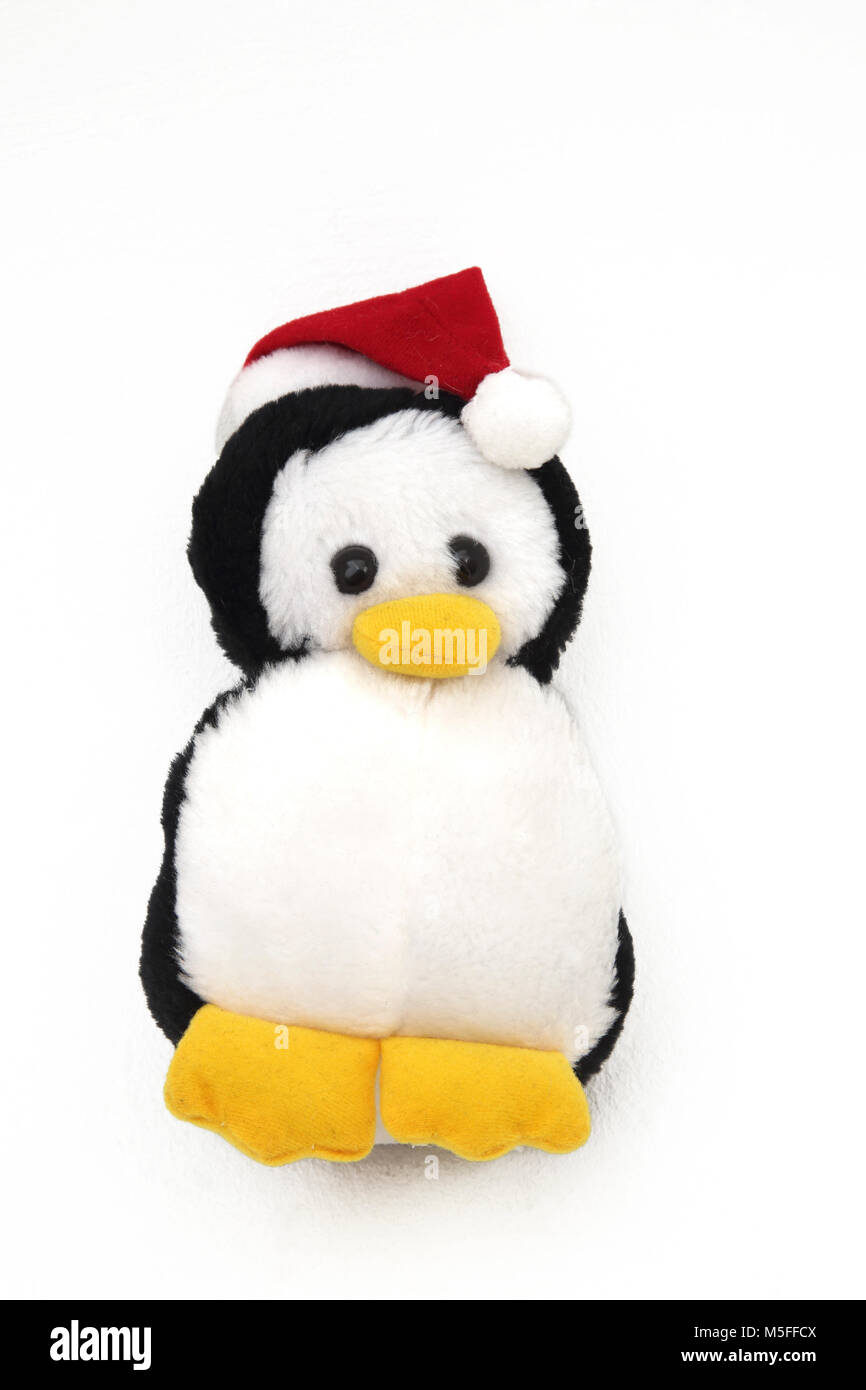 Pinguino giocattolo morbido con Santa Hat Foto Stock