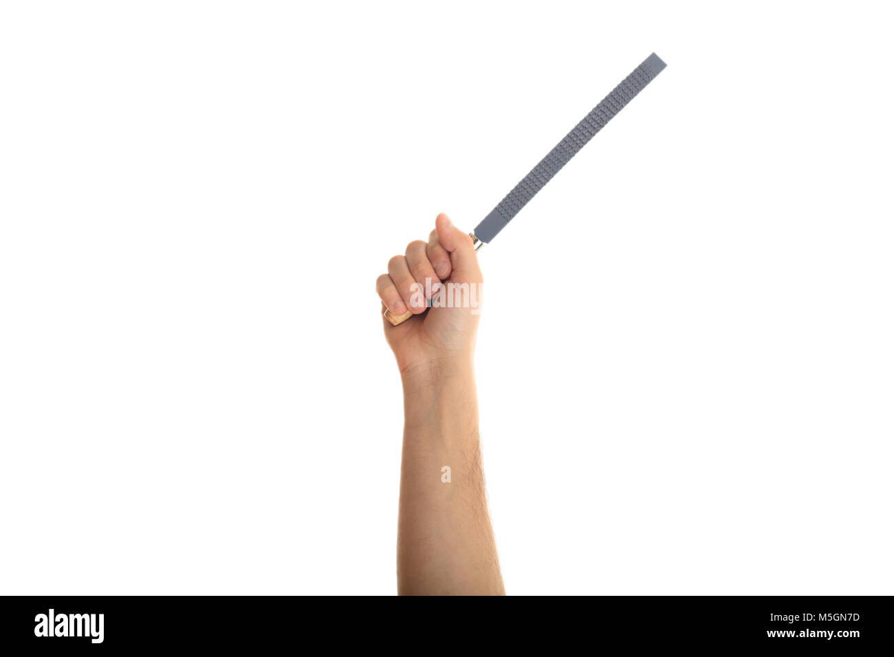 Mano che tiene una raspa file su sfondo bianco Foto Stock