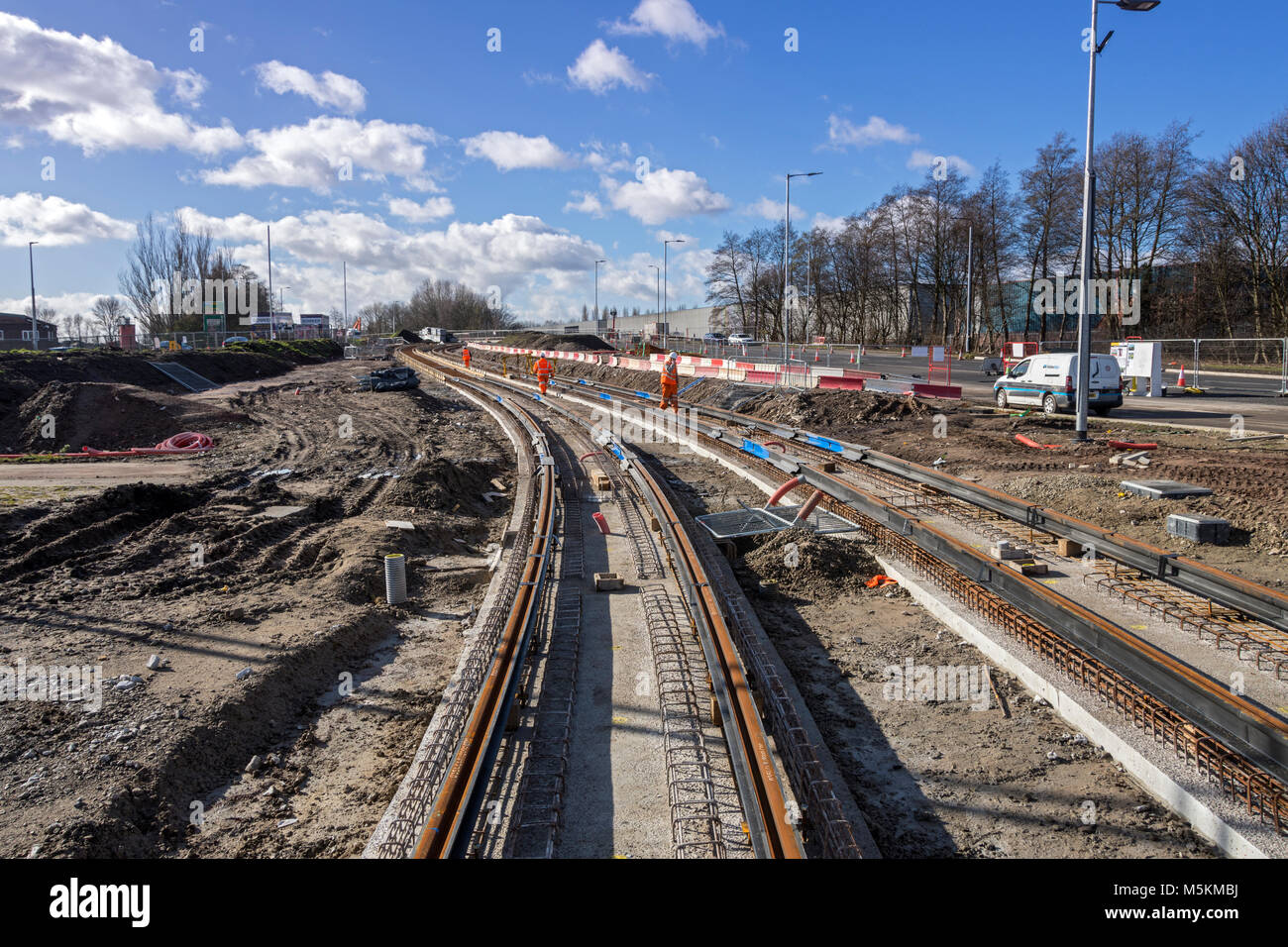 Prima sezione di binari del tram per essere posato sul metrolink Trafford Park linea, Parkway, Trafford Park, Manchester, Regno Unito Foto Stock
