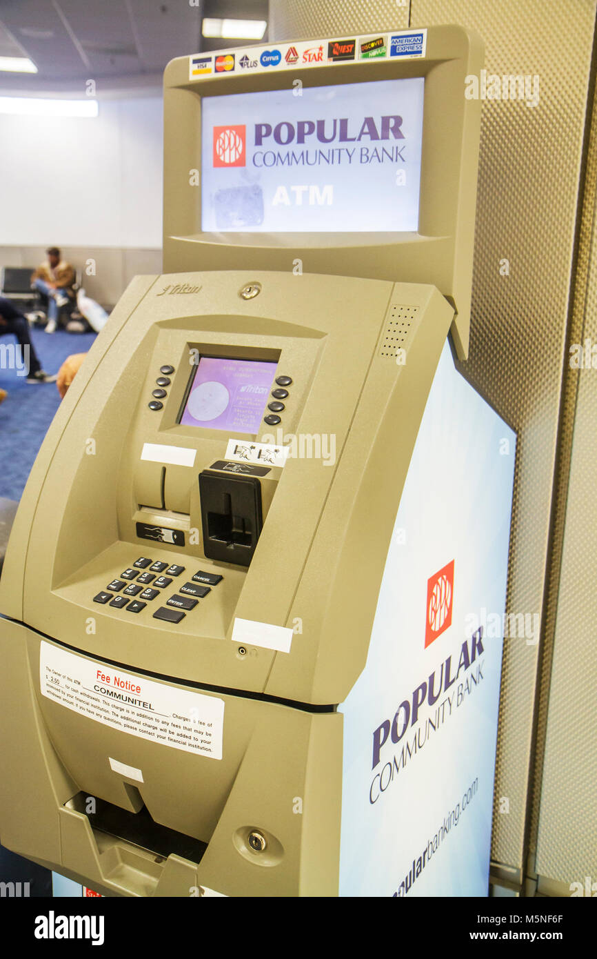 Miami Florida International Airport mia,terminal,gate,ATM,machine,money,banking,popular Community Bank,self service,looking FL120616025 Foto Stock