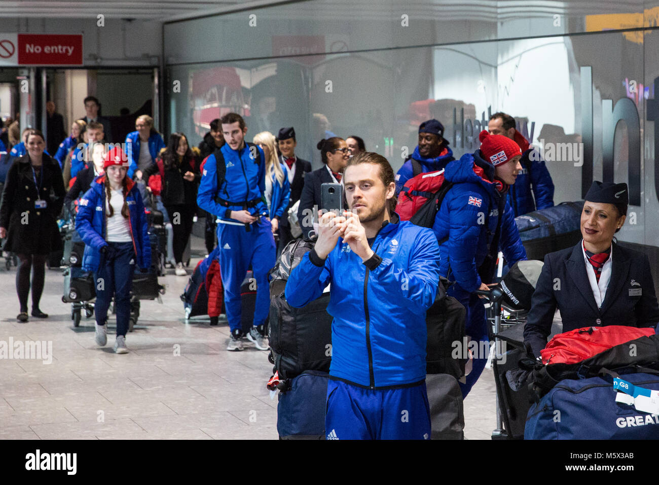 Londra, Regno Unito. Il 26 febbraio, 2018. La British Olympic Association (BOA) accoglie favorevolmente Team GB atleti home da Pyeongchang 2018 Giochi Olimpici Invernali presso l'aeroporto di Heathrow. Credito: Mark Kerrison/Alamy Live News Foto Stock