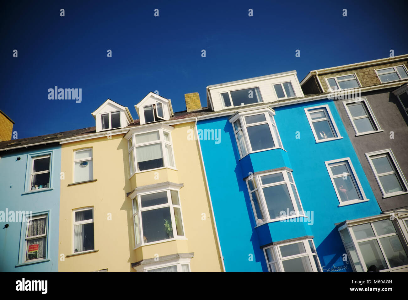 Aberystwyth lungomare case e pensioni lungo l'esplanade Galles Ceredigion REGNO UNITO Foto Stock