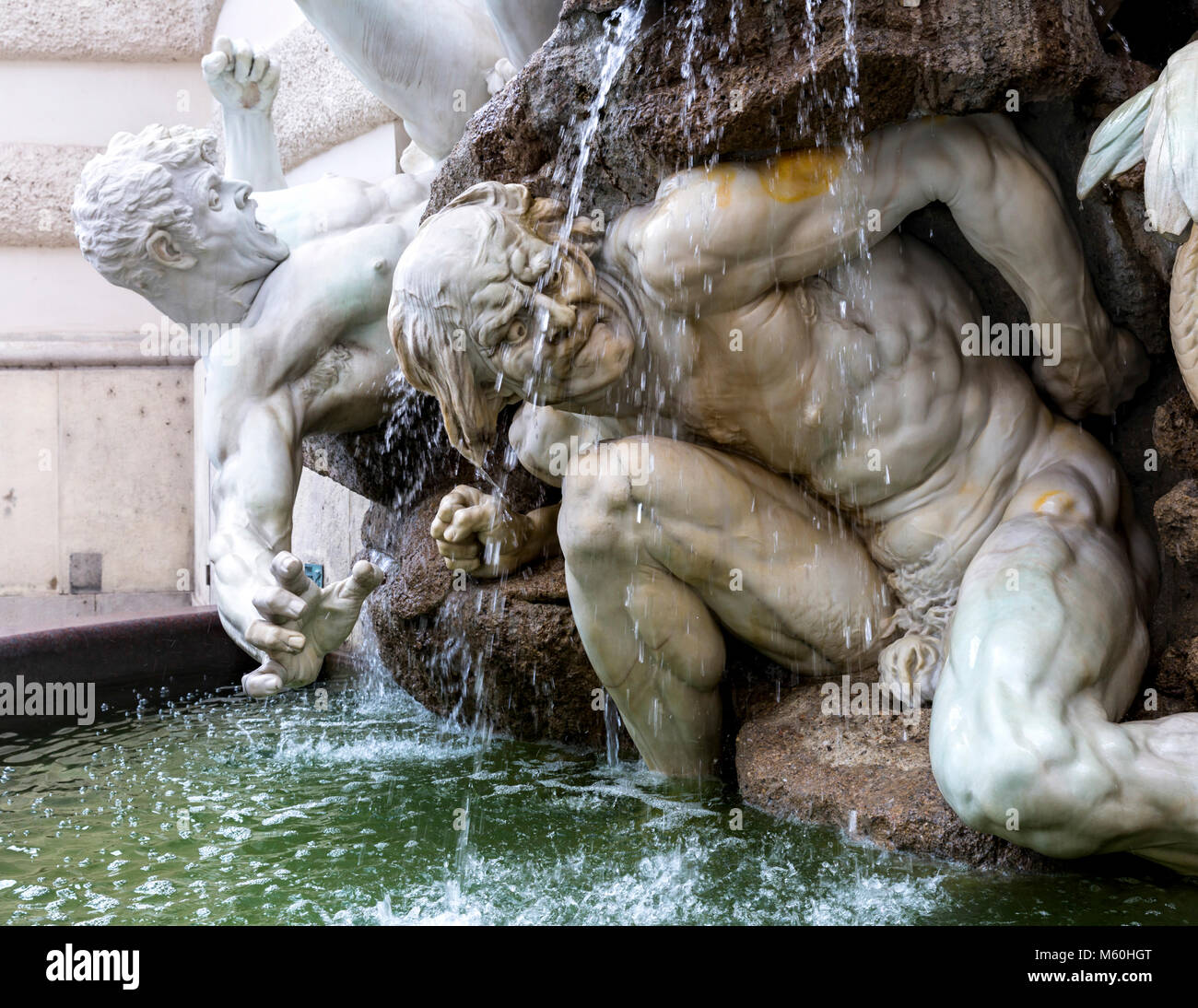 Dettaglio del potere sulla terra fontana, il Palazzo di Hofburg, Michaelertrakt, Wien, Vienna, Austria. Foto Stock