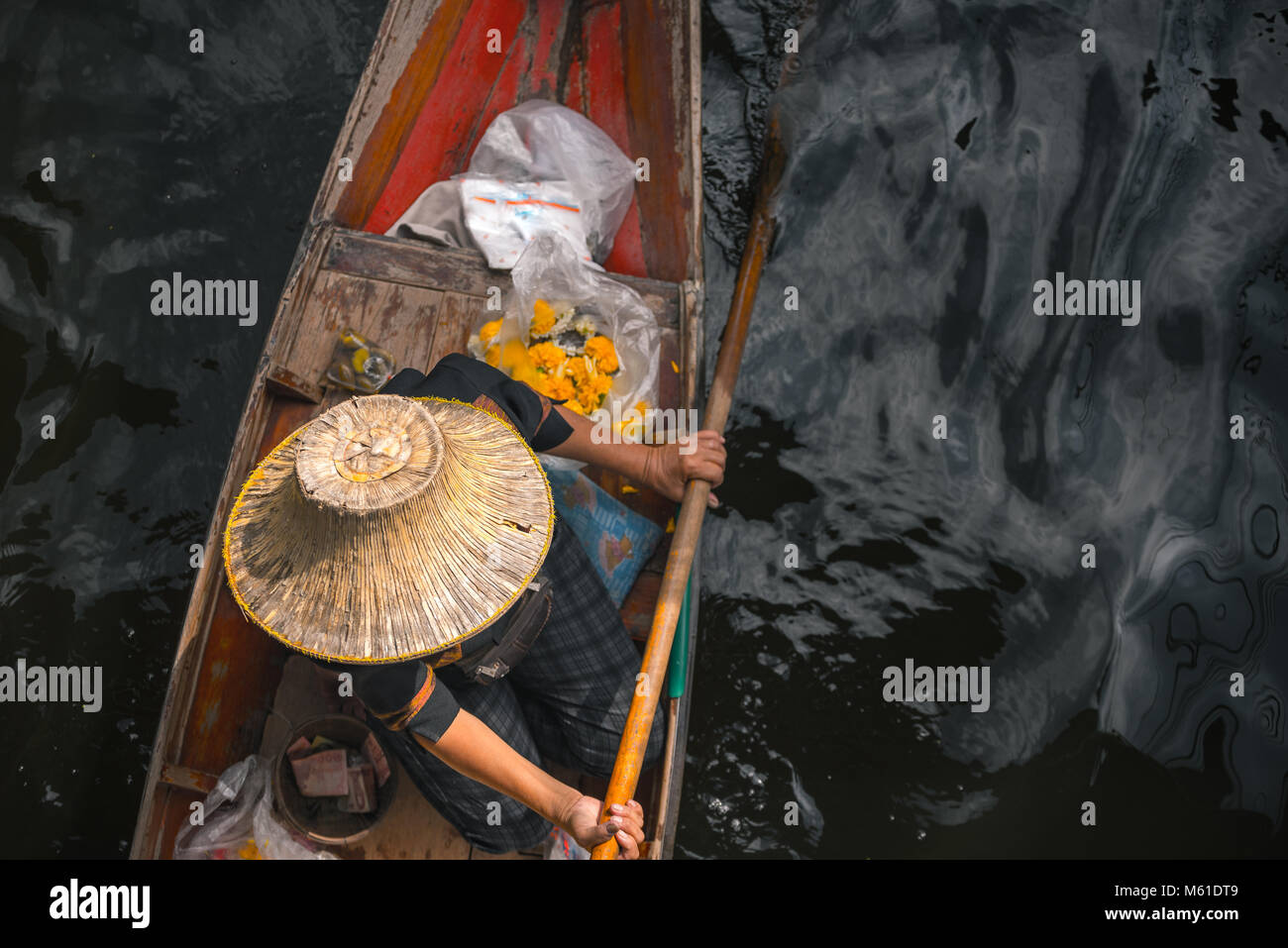 Trader con ex volte hat è paddle canotto. Foto Stock