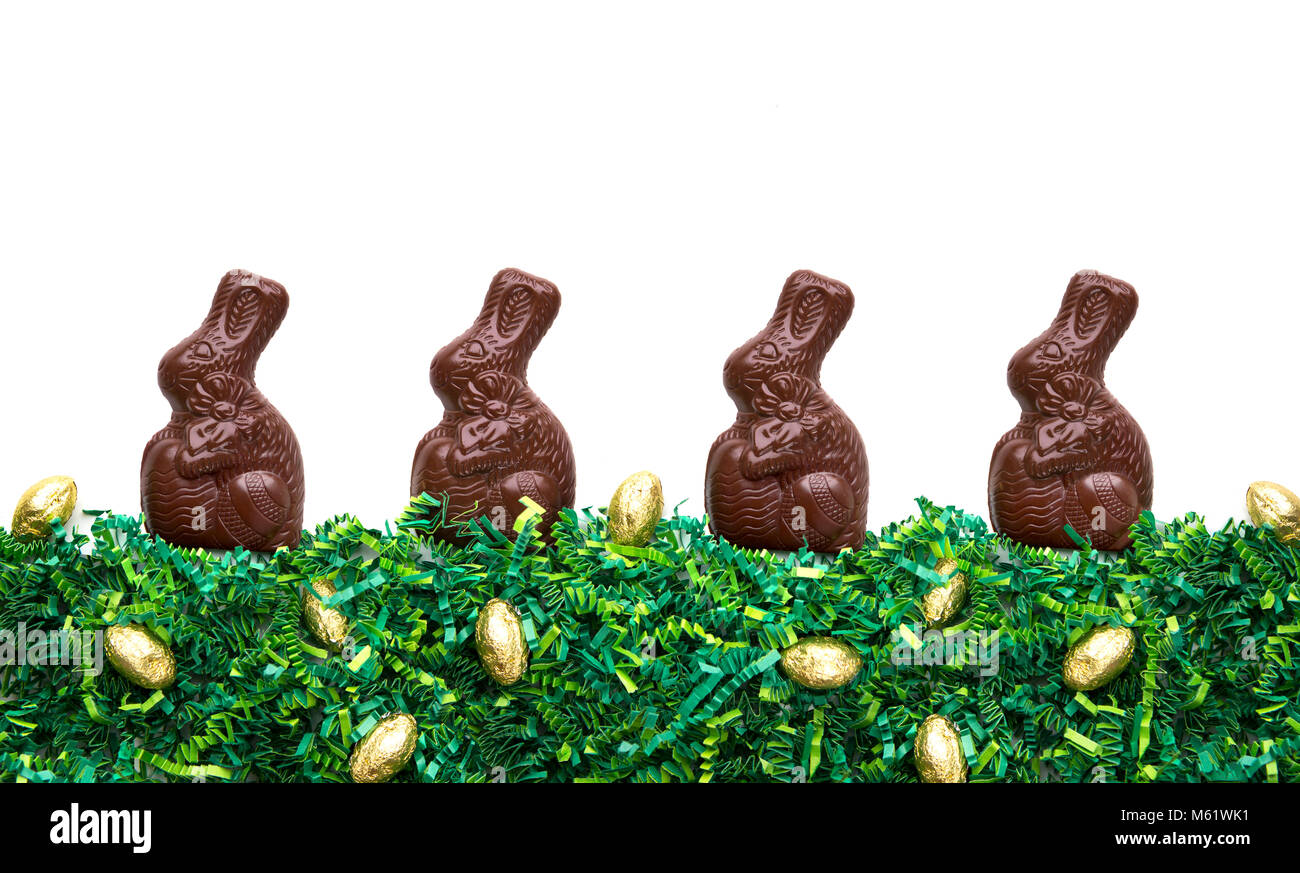 Il cioccolato conigli pasquali in una riga Foto Stock