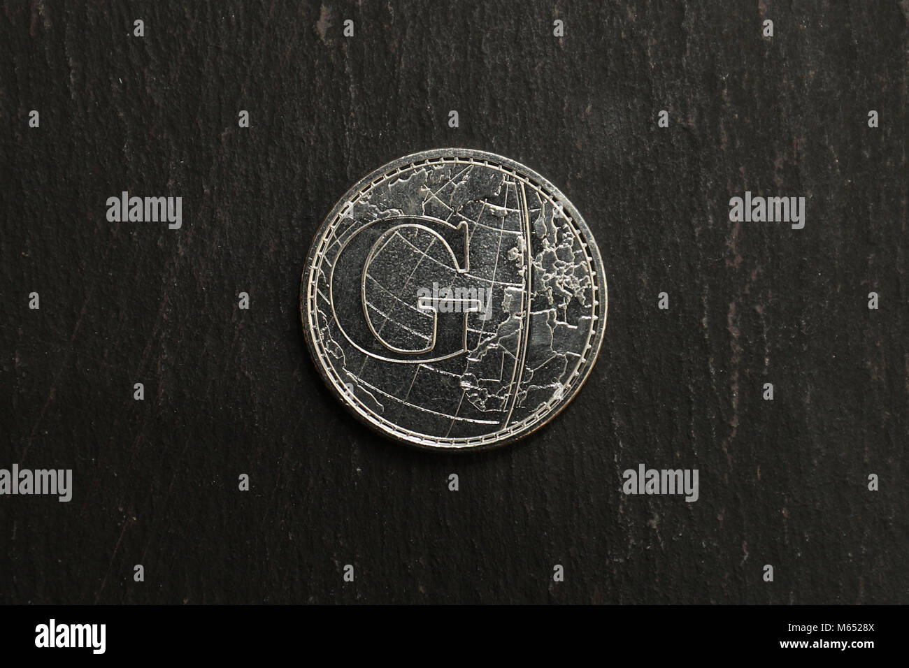 Uno dei 10 nuovissimi design da 26 pence della Royal Mint, la lettera G, che apparirà in tutto il paese come parte della "Great British Coin Hunt", celebrando ciò che rende grande la Gran Bretagna. Foto Stock