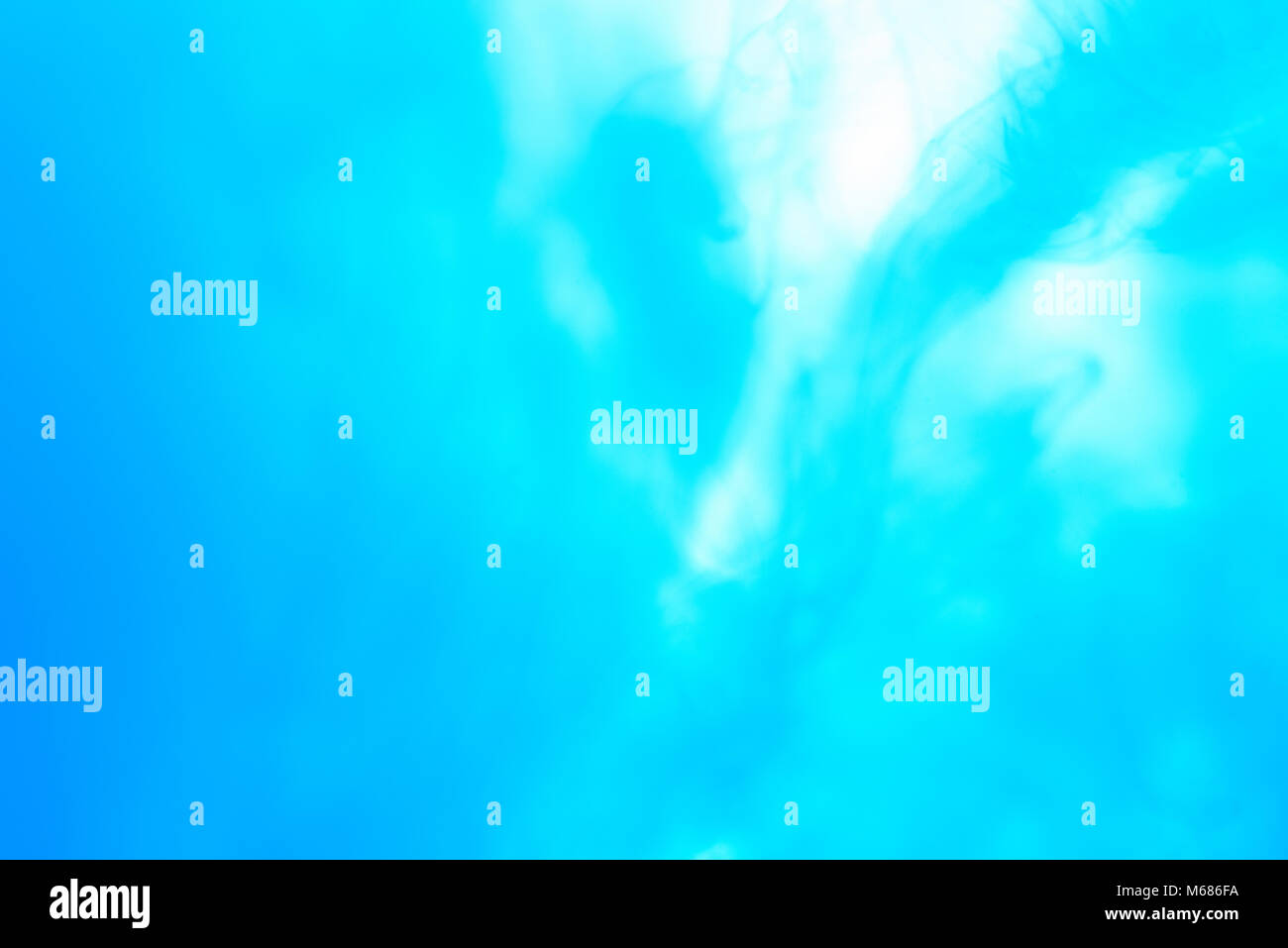 Abstract colorato sfondo blu. Inchiostro blu mix di pigmento Foto Stock