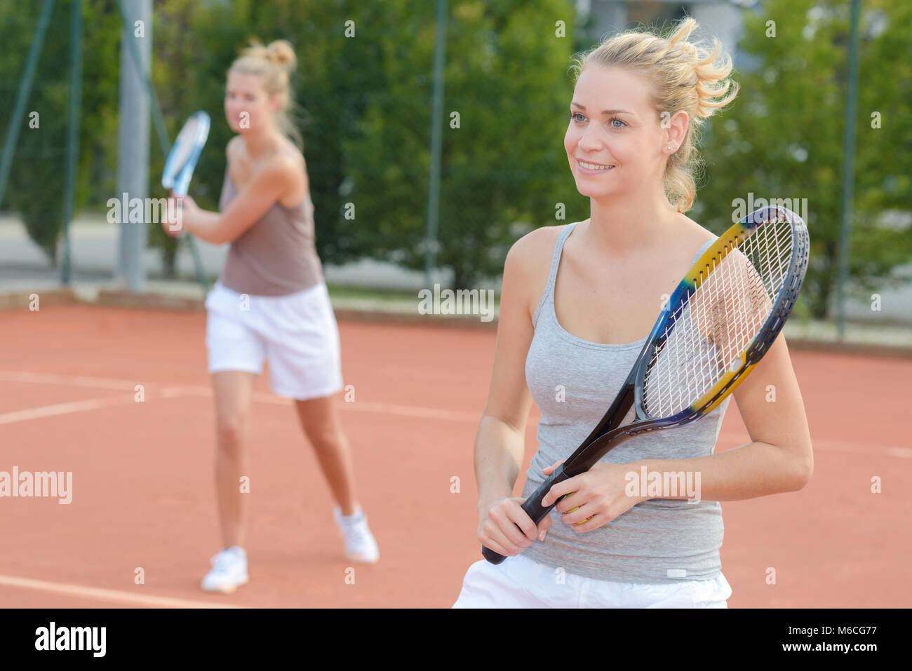 Donne Doppio gioco di tennis Foto Stock