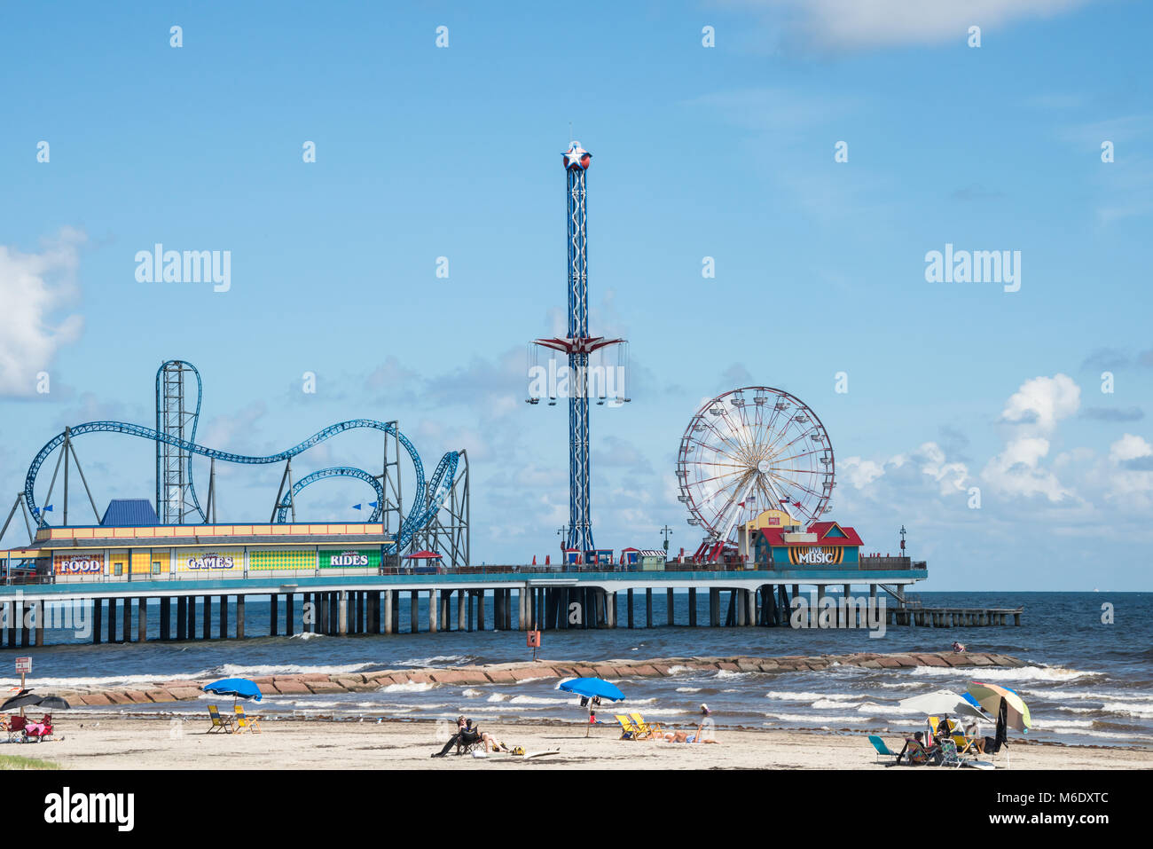 Galveston, Texas, piacere Pier e Spiaggia off Seawall Foto Stock