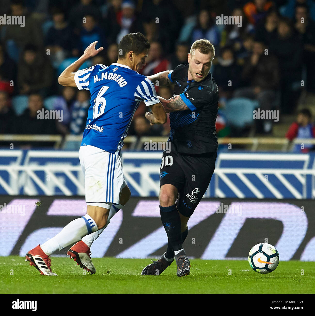 San Sebastian, Spagna. 04 Mar, 2018. (10) Giovanni Guidetti, (6) Hector Alfredo Moreno durante la spagnola La Liga partita di calcio tra Real Sociedad e Deportivo Alaves, a Stadio Anoeta, a San Sebastian, Spagna settentrionale, domenica di marzo. 04, 2018. Credito: Gtres Información más Comuniación on line, S.L./Alamy Live News Foto Stock San Sebastian, Spagna. 04 Mar, 2018. (10) Giovanni Guidetti, (6) Hector Alfredo Moreno durante la spagnola La Liga partita di calcio tra Real Sociedad e Deportivo Alaves, a Stadio Anoeta, a San Sebastian, Spagna settentrionale, domenica di marzo. 04, 2018. Credito: Gtres Información más Comuniación on line, S.L./Alamy Live News Foto Stock