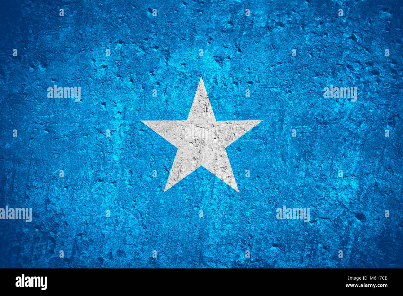 Bandiera della Somalia o bandiera somala su graffiato la trama grossolana Foto Stock