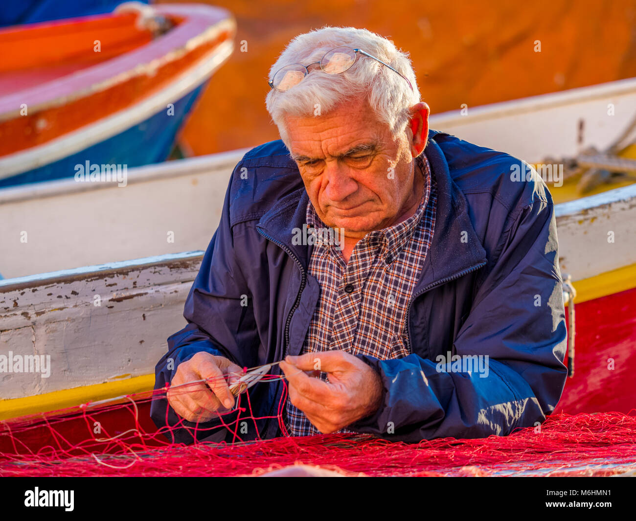 Rammendo delle reti da pesca sull isola di Procida, Italia Foto Stock