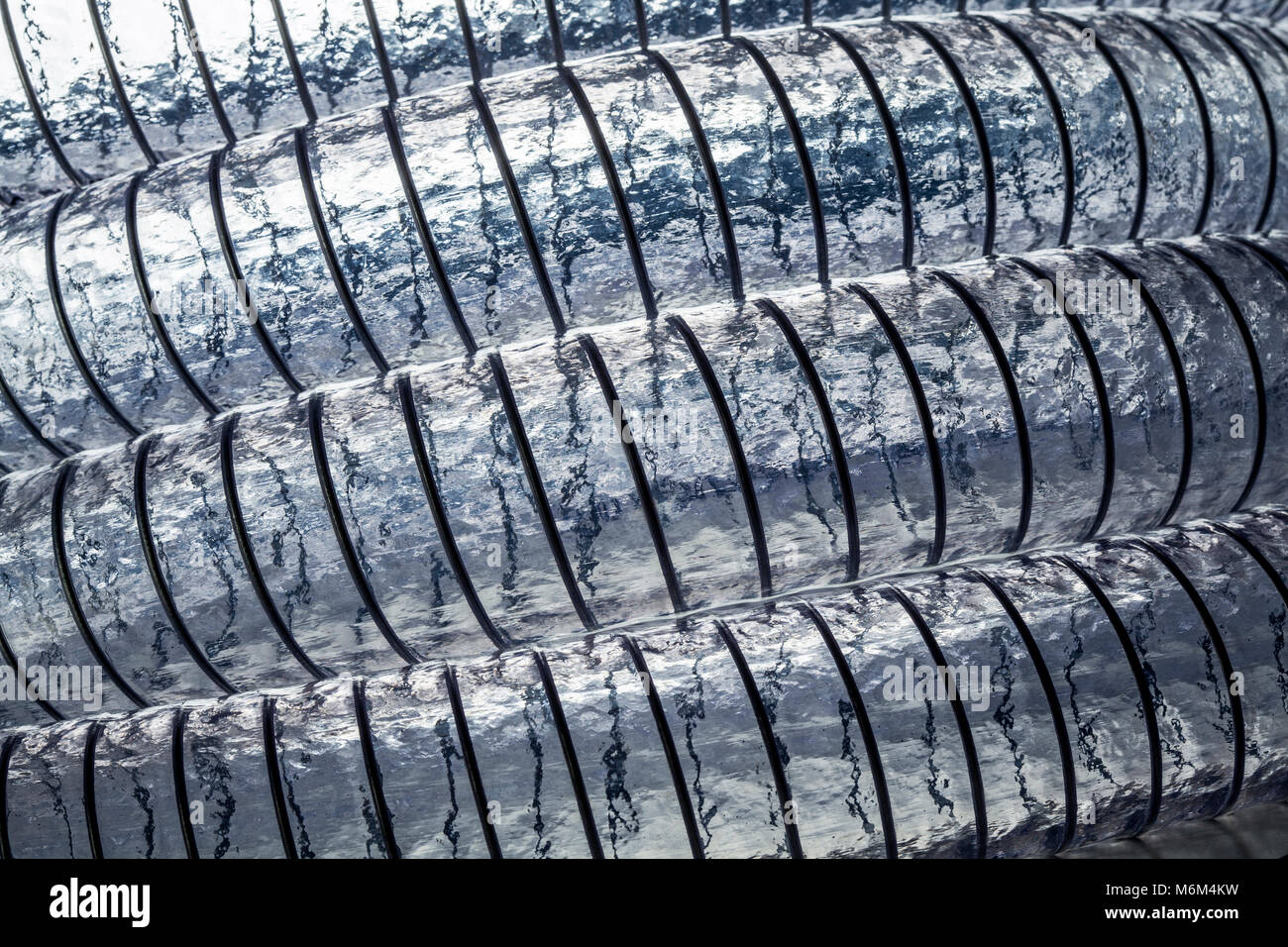 Trasparente in PVC a spirale dettaglio del tubo Foto Stock