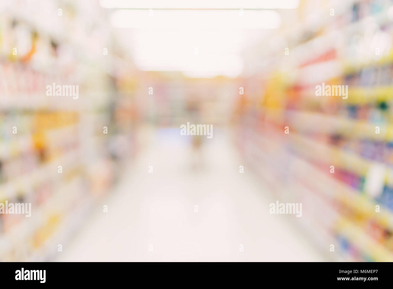 Sfondo sfocato - negozio del centro commerciale per lo shopping di sfocatura con sfondo bokeh di fondo. Foto Stock