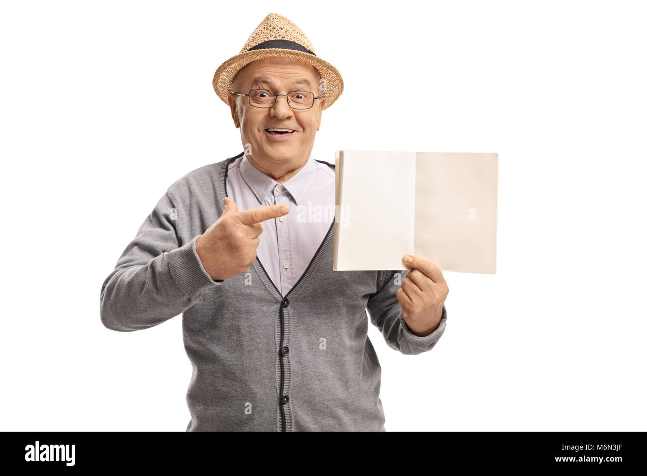 Uomo maturo in possesso di un notebook in bianco e puntamento isolati su sfondo bianco Foto Stock