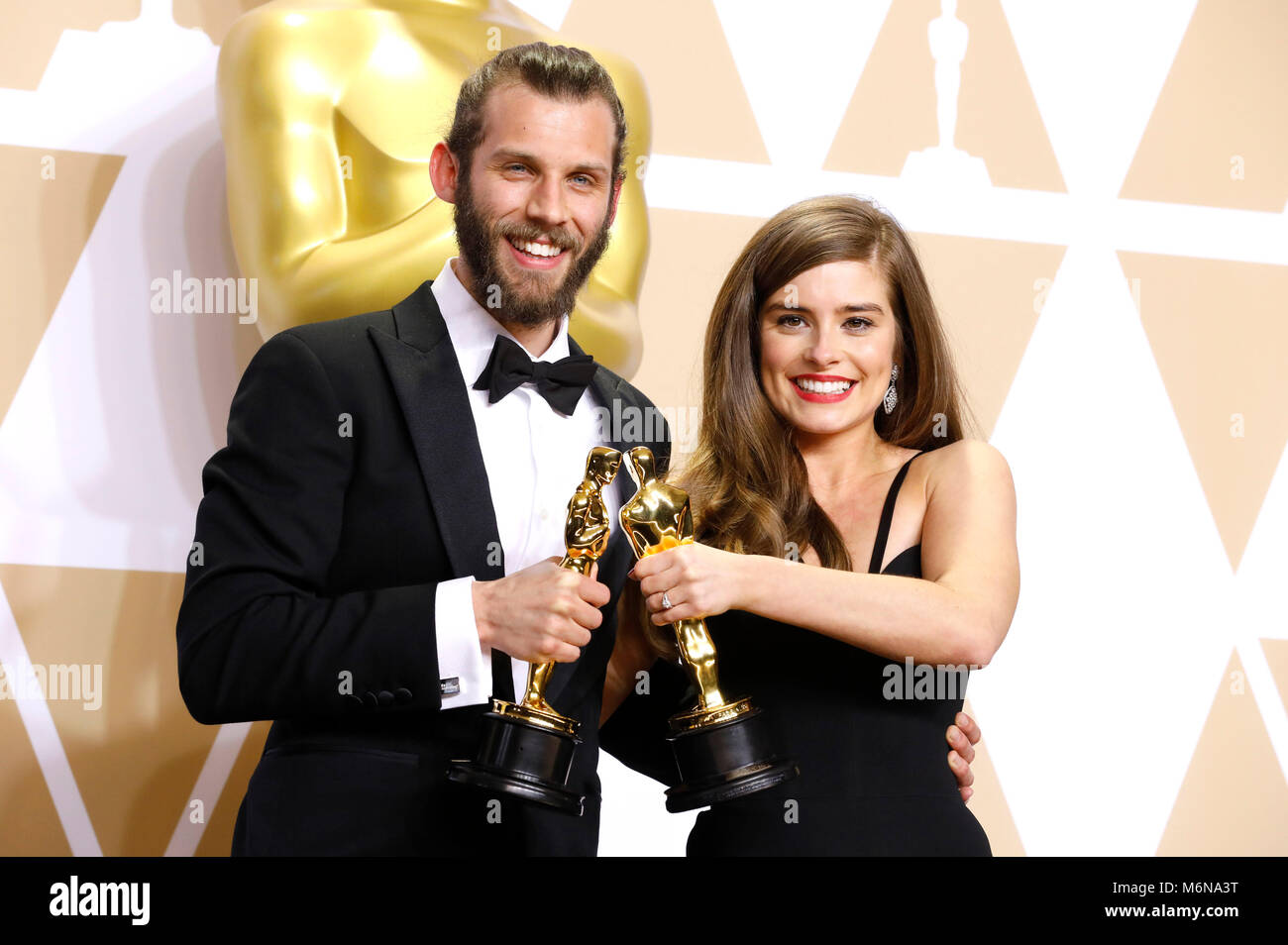 Chris Overton e Rachel Shenton, i vincitori del premio per "Best live action short film", pongono in sala stampa al novantesimo annuale di Academy Awards di Hollywood & Highland Center su Marzo 4, 2018 in Hollywood, la California. Foto Stock