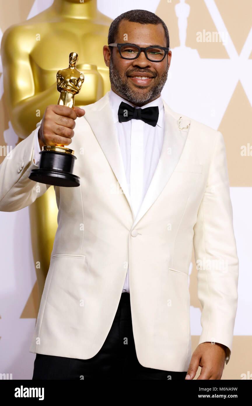 Jordan Peele, vincitore del premio per la migliore sceneggiatura originale", pone in sala stampa al novantesimo annuale di Academy Awards di Hollywood & Highland Center su Marzo 4, 2018 in Hollywood, la California. Foto Stock