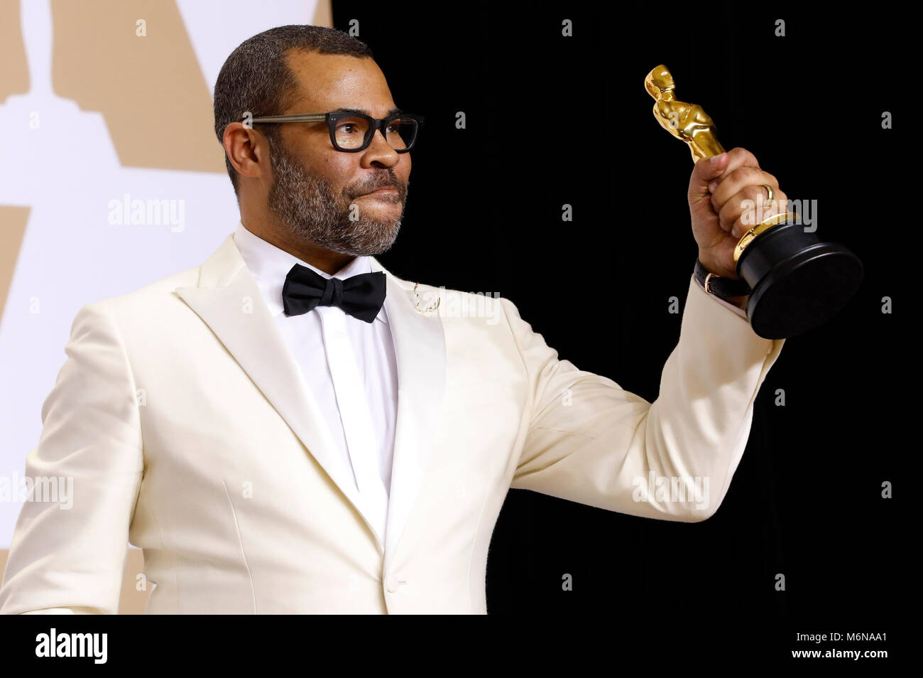Jordan Peele, vincitore del premio per la migliore sceneggiatura originale", pone in sala stampa al novantesimo annuale di Academy Awards di Hollywood & Highland Center su Marzo 4, 2018 in Hollywood, la California. Foto Stock