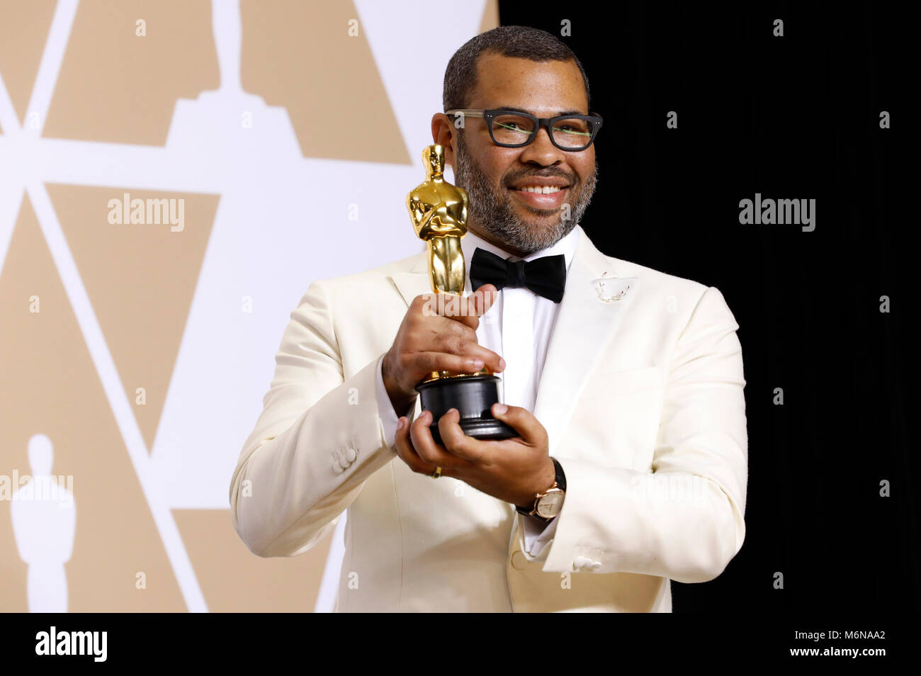 Jordan Peele, vincitore del premio per la migliore sceneggiatura originale", pone in sala stampa al novantesimo annuale di Academy Awards di Hollywood & Highland Center su Marzo 4, 2018 in Hollywood, la California. Foto Stock