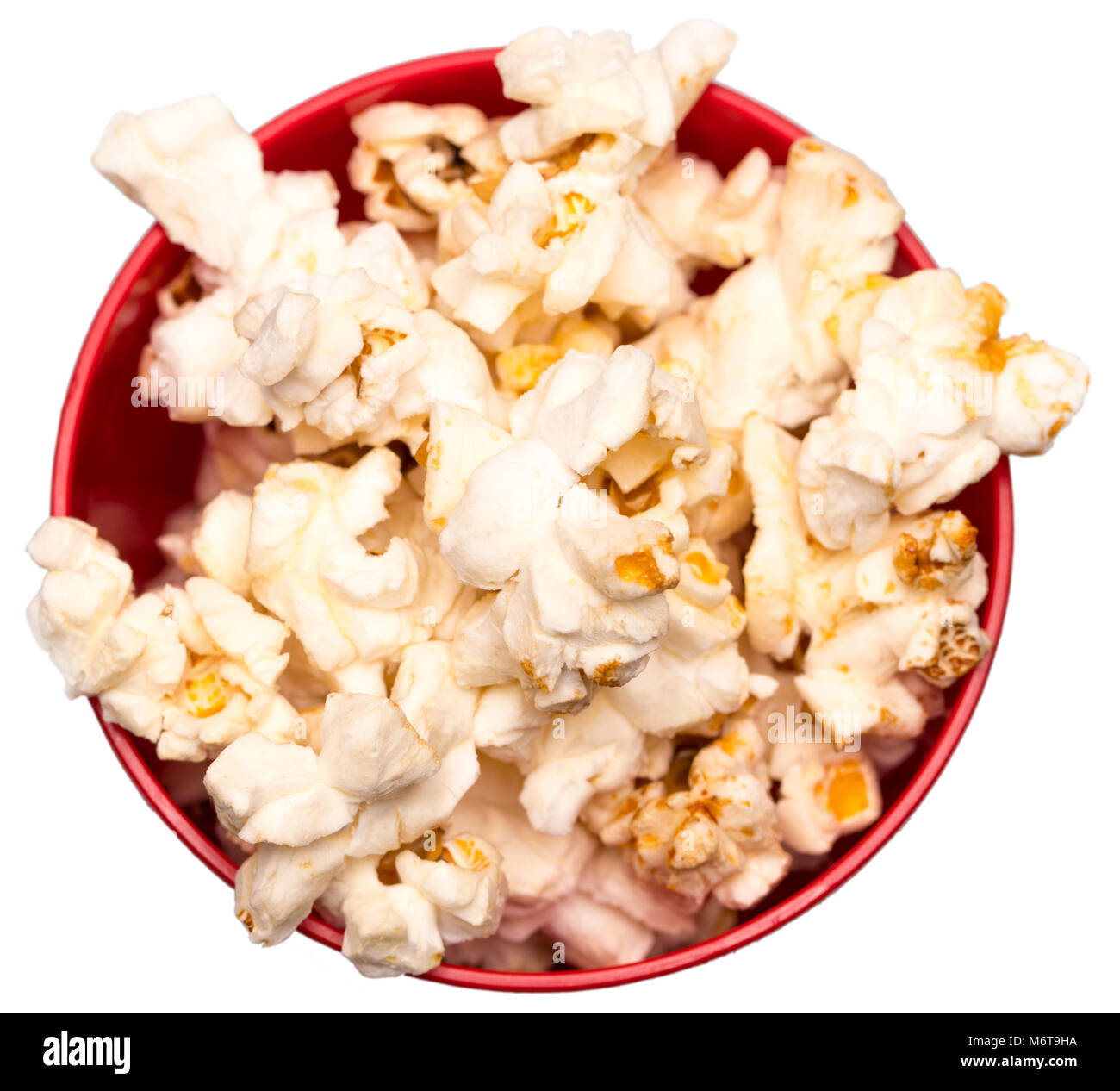 Il popcorn in una ciotola rossa vista dall'alto. Foto Stock
