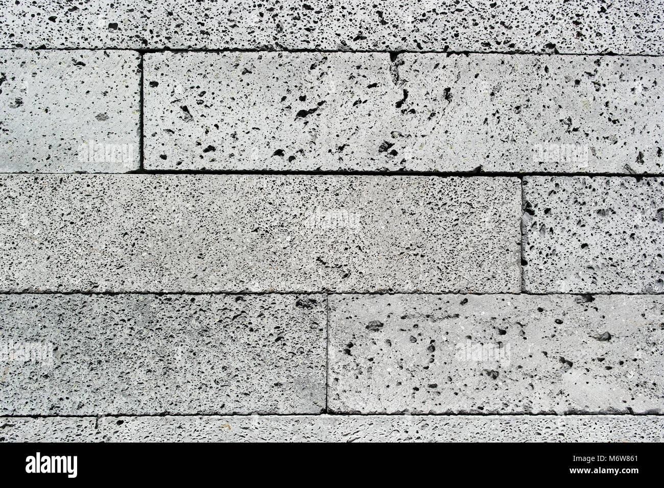 Dettaglio di un muro fatto di pietra vulcanica Foto Stock