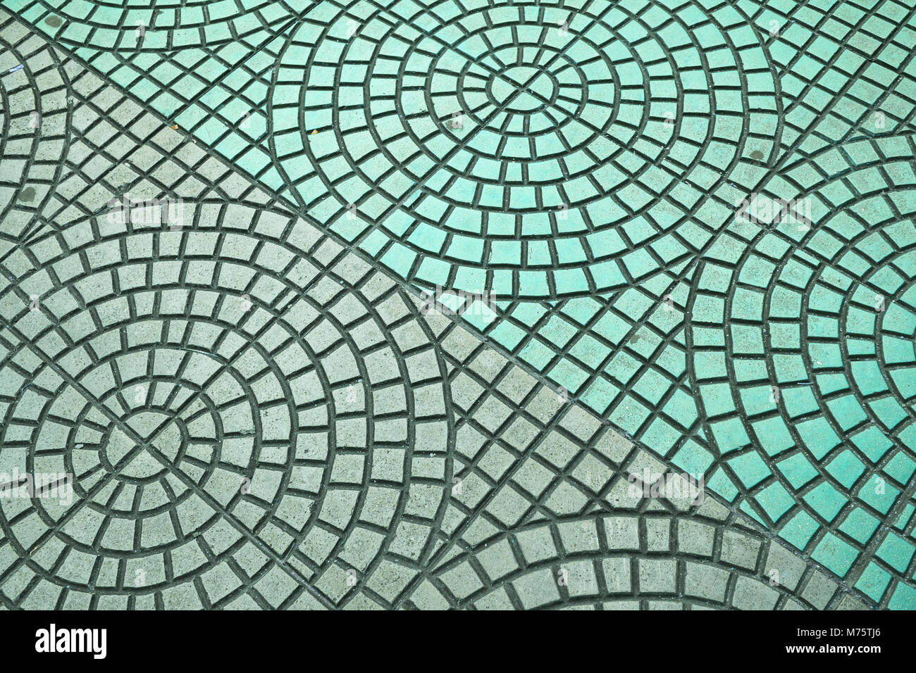Bellissimo colore turchese pavimento in mattoni in cerchi e in forma quadrata Foto Stock