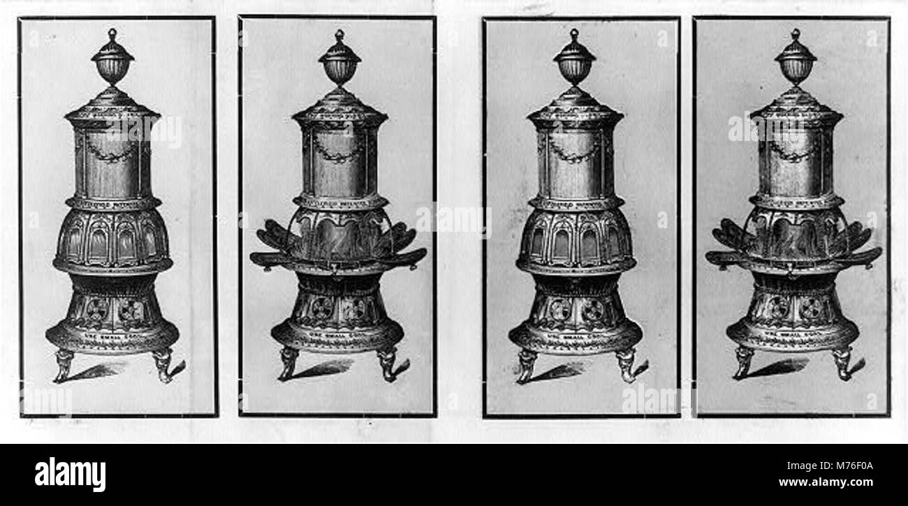 Le stufe a carbone vecchio stile erano comunemente usate per riscaldare case durante la fine del XIX secolo e l'inizio del XX secolo. Queste stufe utilizzavano carbone come fonte di carburante per fornire calore in ambienti domestici. Foto Stock