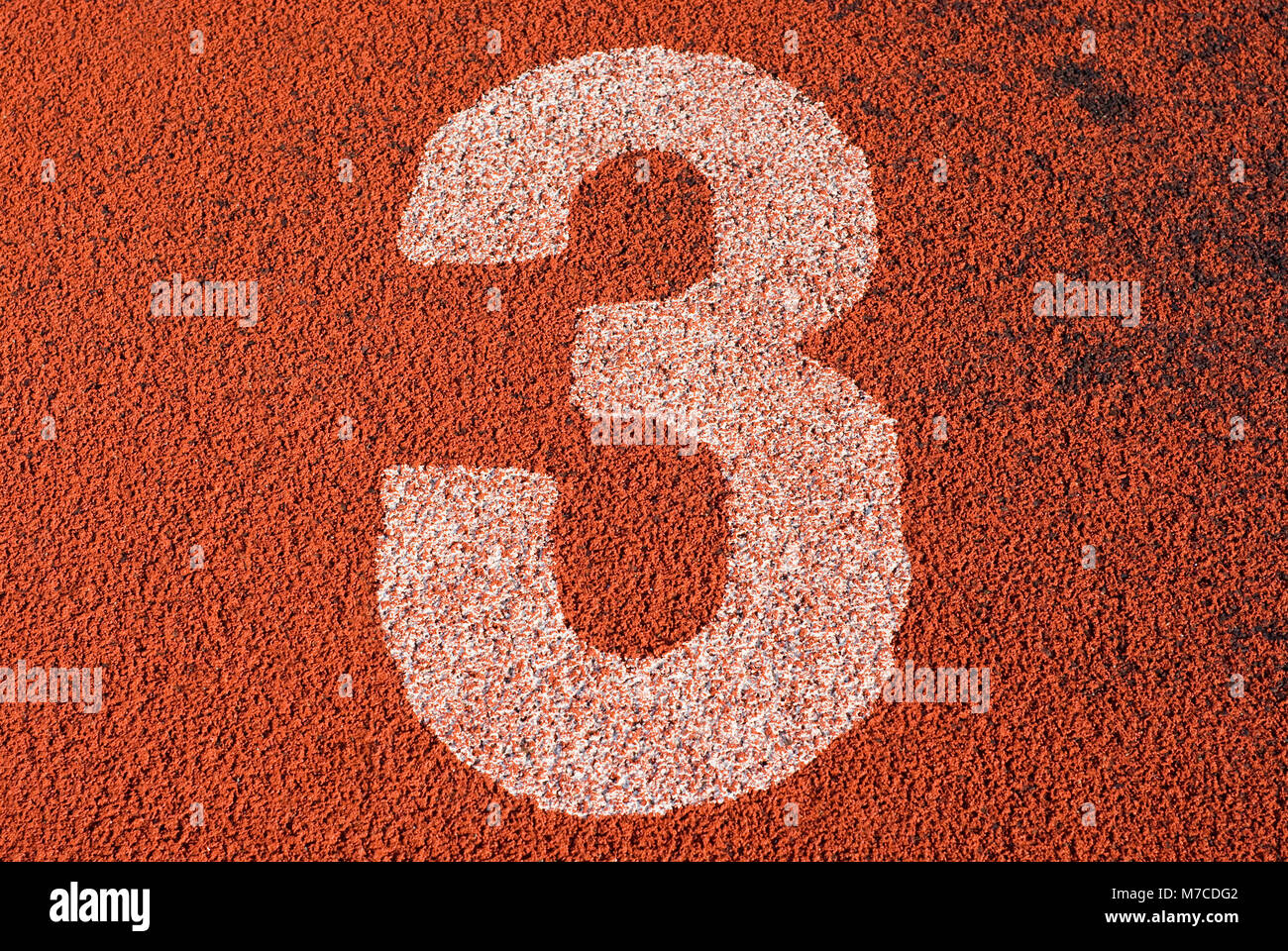 Numero di traccia 3 di una via di corsa Foto Stock