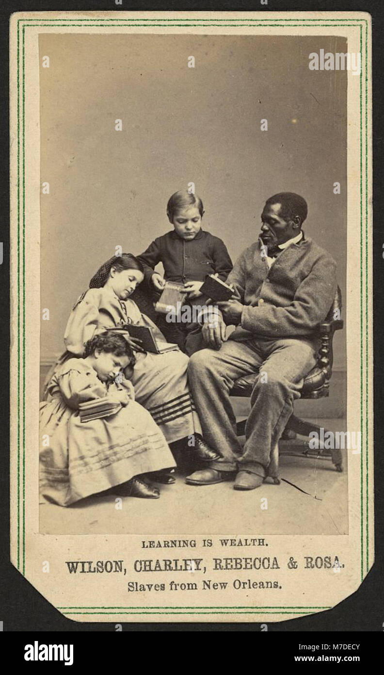 Questa fotografia cattura quattro ex schiavi di New Orleans, Wilson, Charley, Rebecca e Rosa, simboleggiano la loro lotta e resilienza nell'era post-schiavitù. Foto Stock