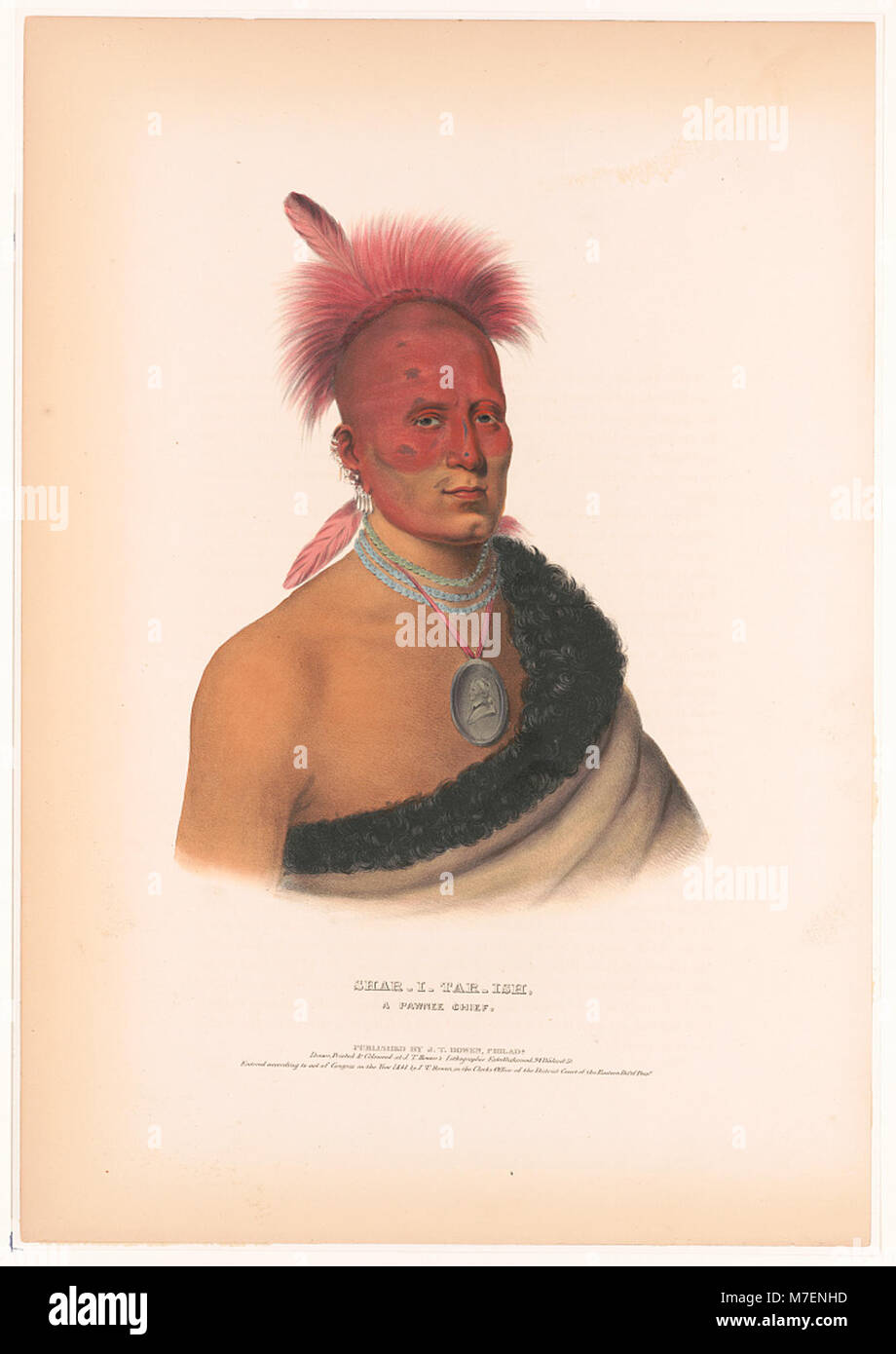 Una fotografia di Shar-i-tar-ish, un capo Pawnee, che mostra la leadership e il patrimonio culturale della nazione Pawnee durante l'inizio del XX secolo. L'immagine cattura una figura significativa dei nativi americani nel suo abbigliamento tradizionale. Foto Stock