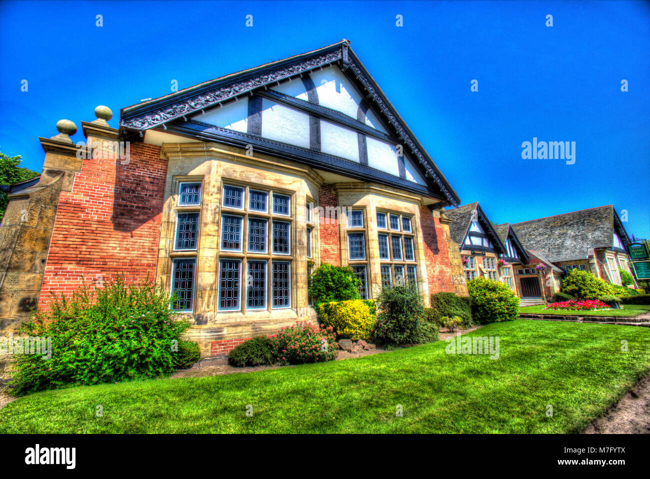 Villaggio di Port Sunlight, Inghilterra. Vista artistico di inizio xx secolo William e Segar Owen progettato Hulme Hall. Foto Stock