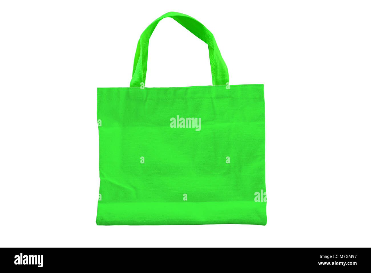 Isolato verde riutilizzabili sacco di tessuto per la conservazione dell ambiente e la campagna per lo shopping. Foto Stock