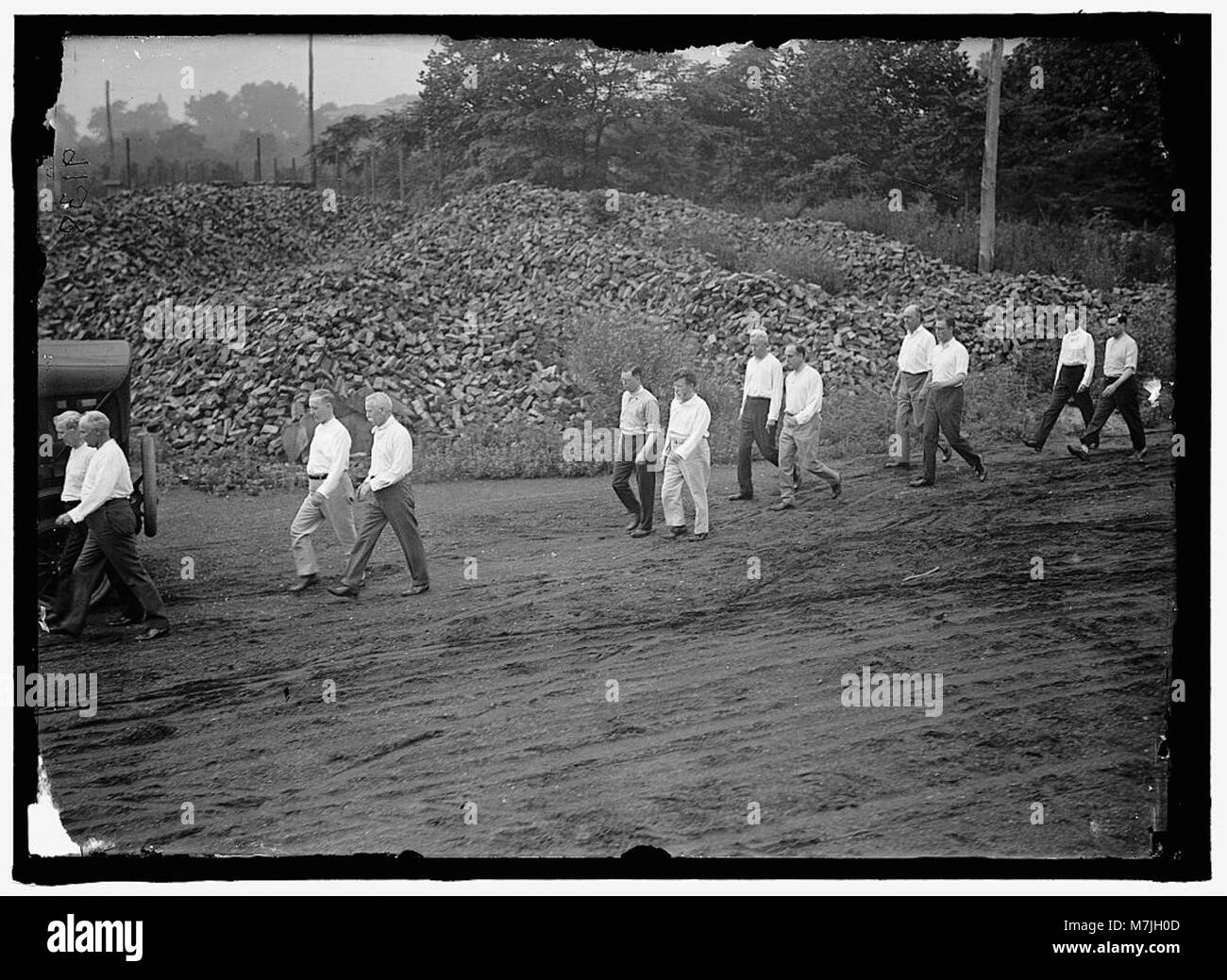 Questa immagine mostra i funzionari del gabinetto degli Stati Uniti che partecipano a una sessione di esercitazione con altri funzionari governativi, sotto la supervisione di Walter Camp, in un programma di educazione fisica correlato al governo. Foto Stock