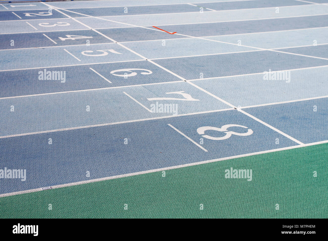 Blocchi di partenza in via di corsa da vicino Foto Stock