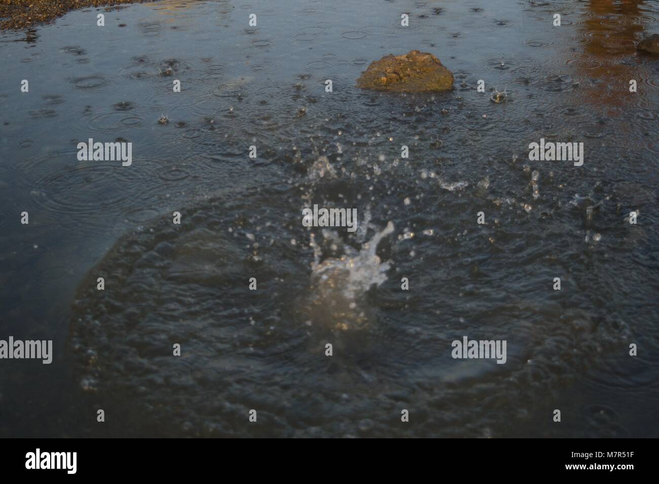 Effetto Splash in spiaggia Foto Stock