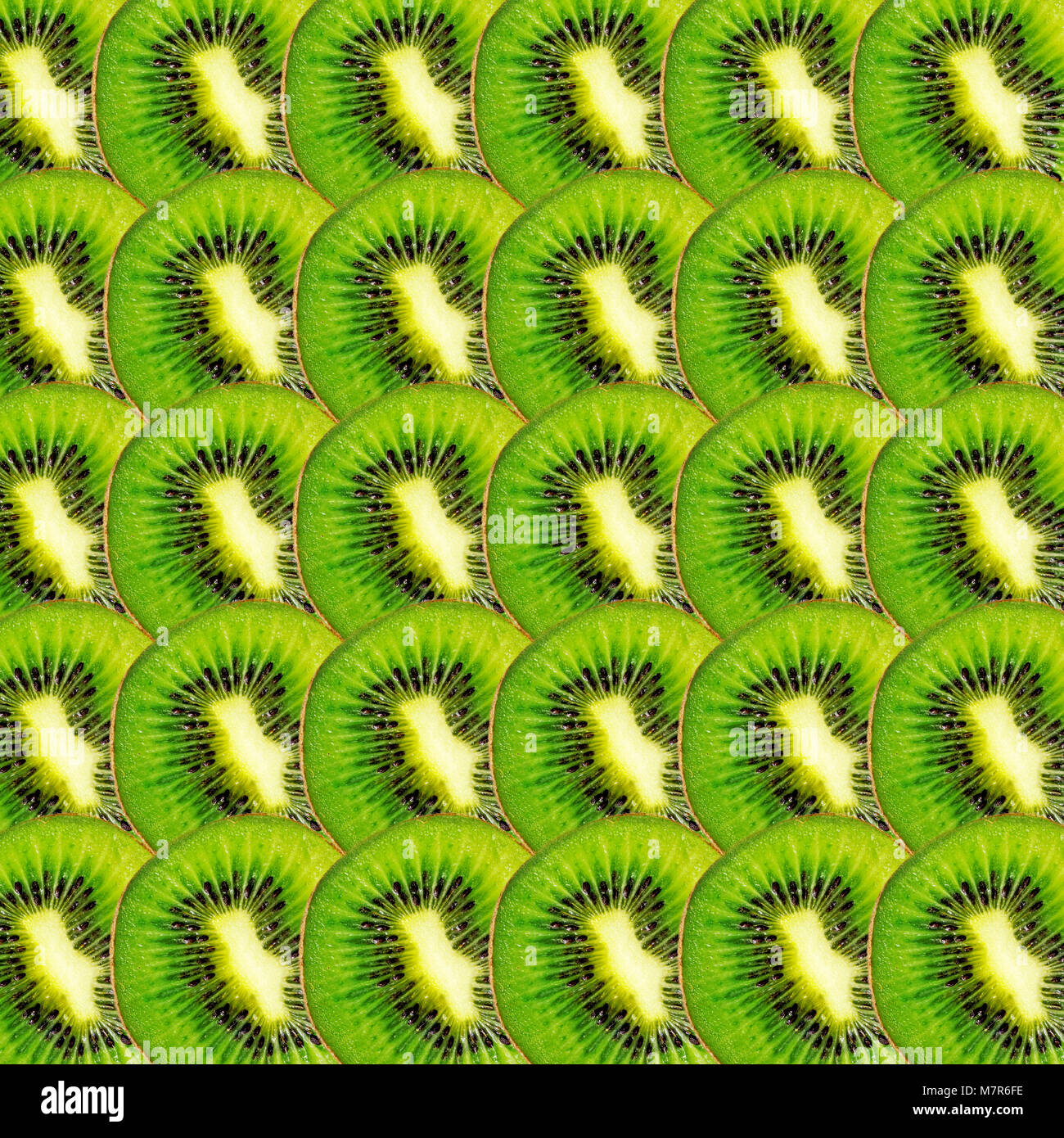 Verde kiwi fette texture, vera e propria foto sfondo alimentare Foto Stock