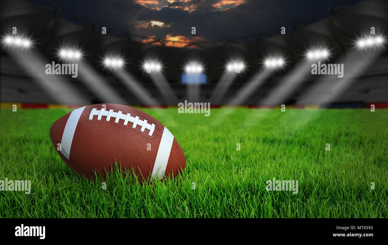 American Football arena con sfera su erba verde illuminazione notturna, rendering 3D Foto Stock