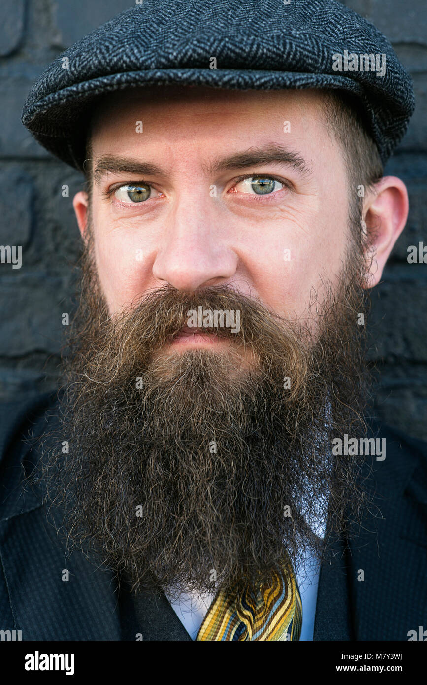 Un uomo con la barba Foto Stock