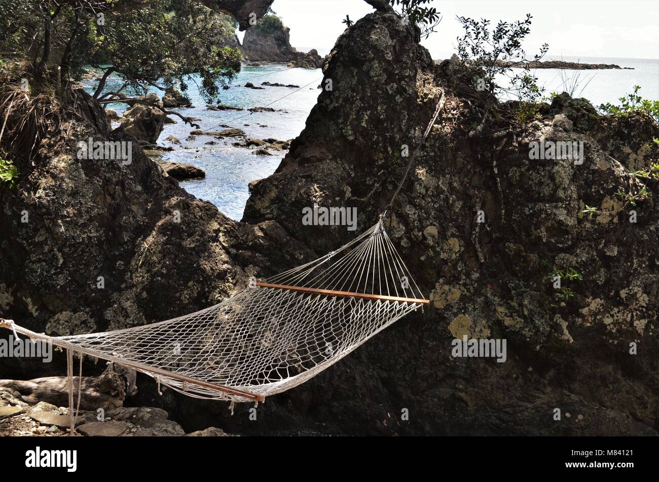 Amaca in spiaggia in atmosfera di vacanza Foto Stock