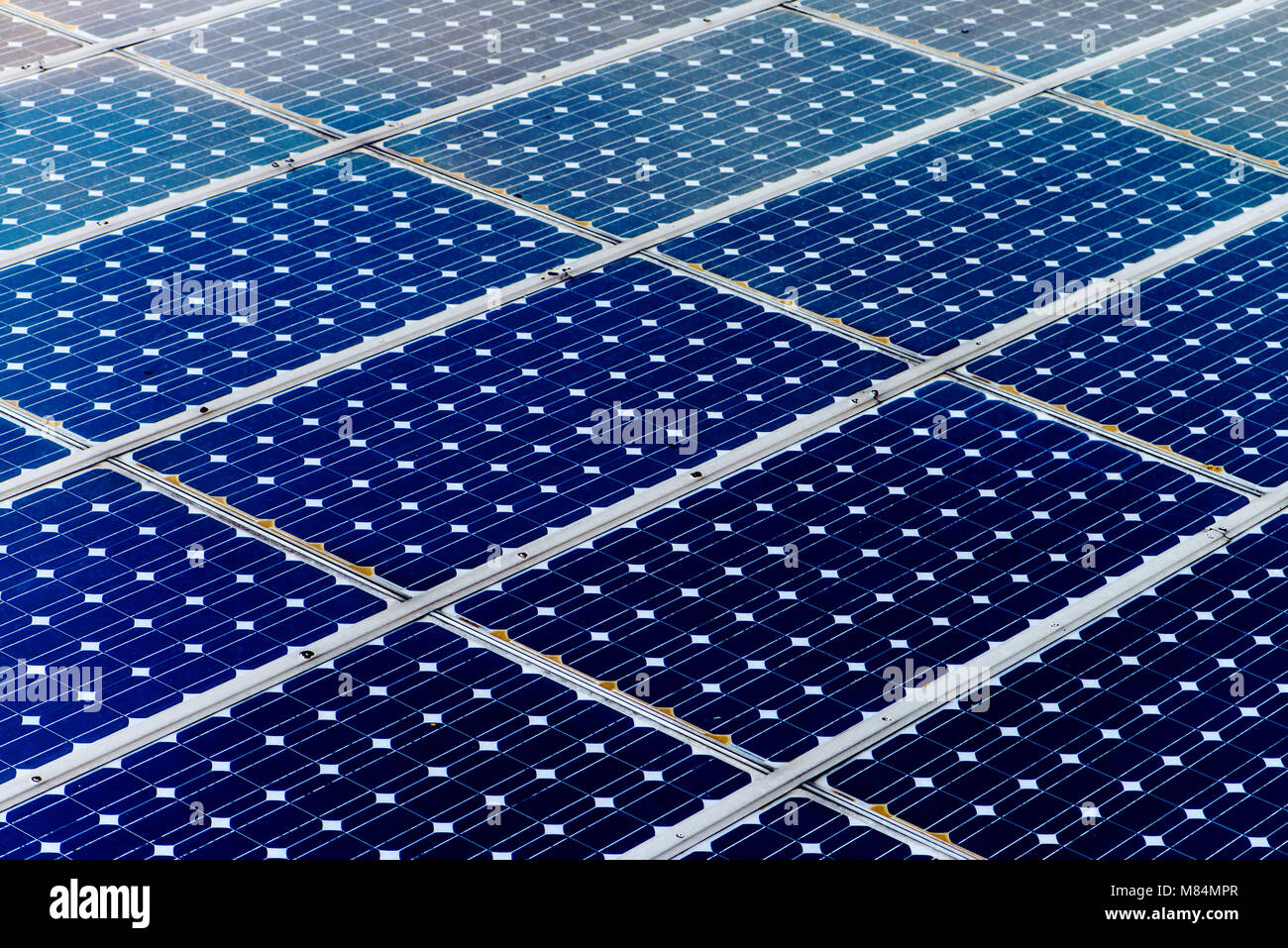 Pannello solare superficie, industria di potenza e tecnologia di sfondo, energia solare e le fonti rinnovabili di energia verde risorse Foto Stock